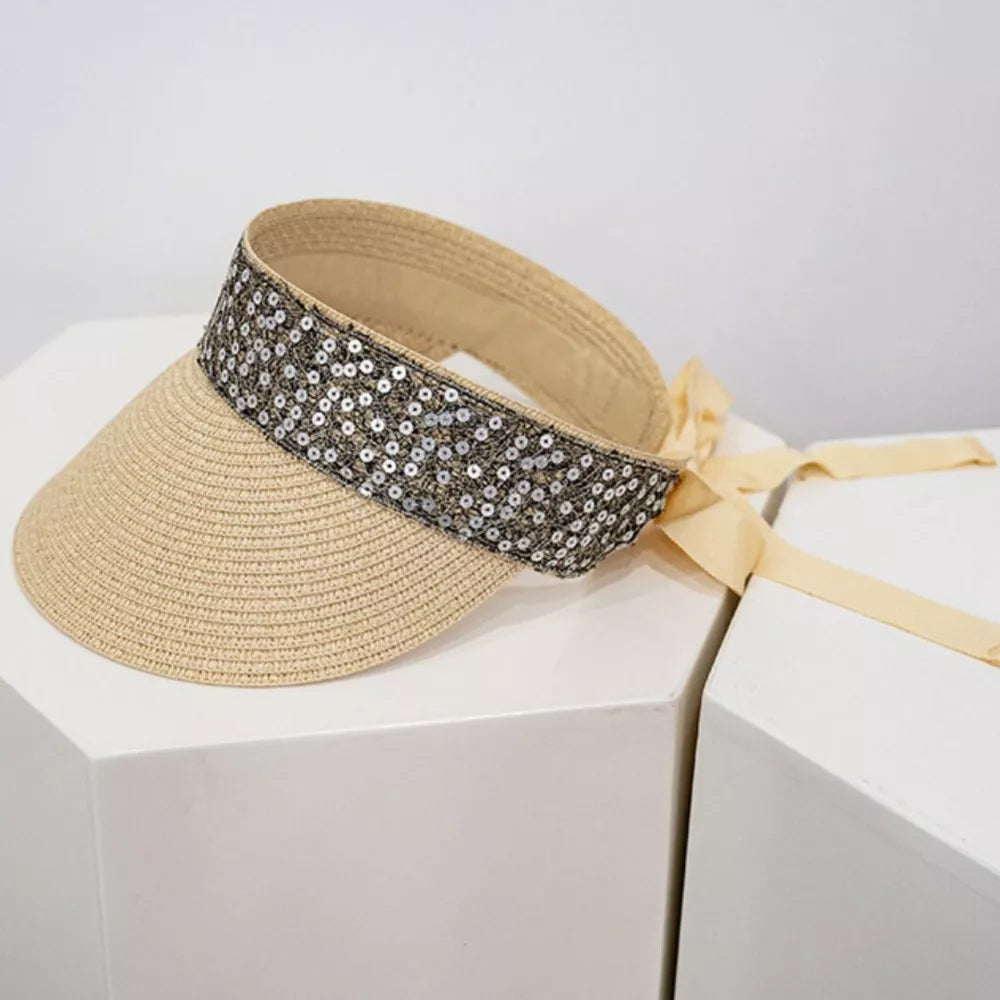 Straw visor hat in beige with sequin band and ribbon tie