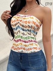 Strapless floral print tank top with ruching and a bow detail.