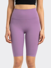 Lavender activewear shorts with a high waist and seamless design.