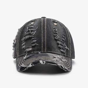 Dark ripped denim baseball cap with distressed details and contrast stitching.