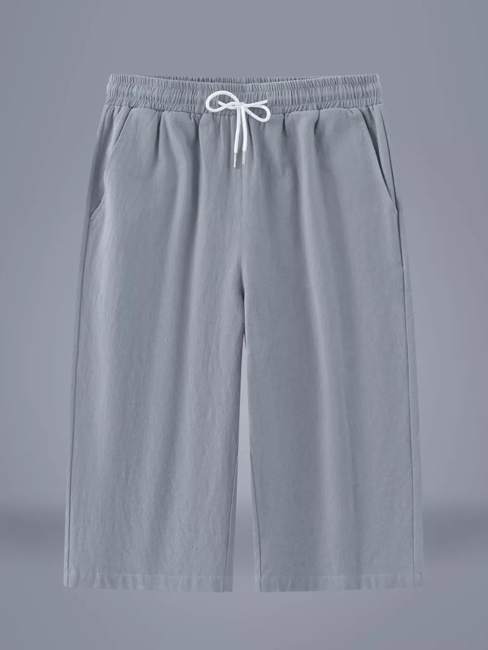 Light gray relaxed fit cropped sweatpants with drawstring waist and pockets