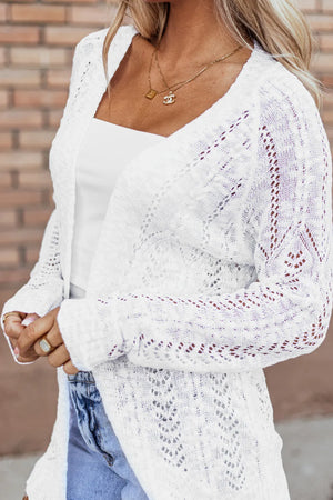 White openwork chevron knit cardigan with long sleeves and a relaxed fit.