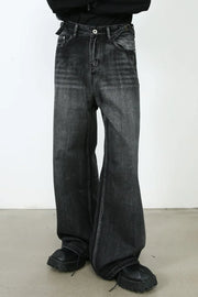Dark wash denim flared trousers with a high waist and belt detail.