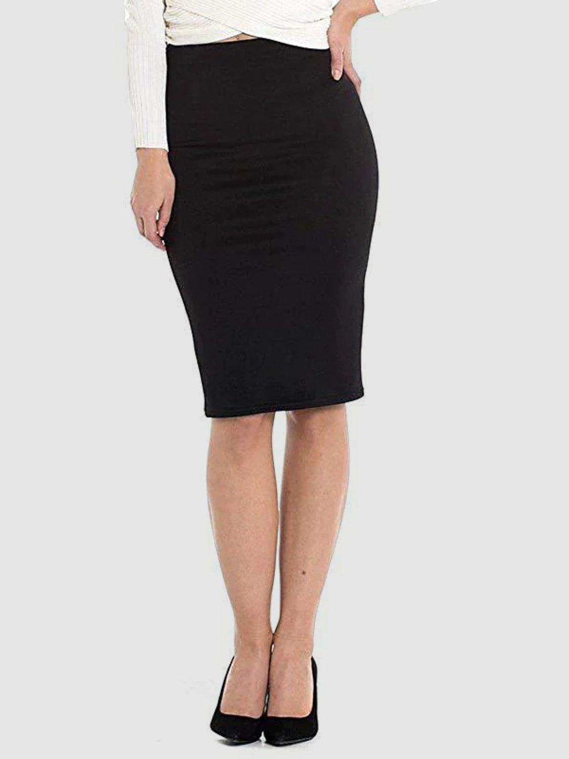 Black pencil skirt with a sculpted fit, knee length, paired with heels.
