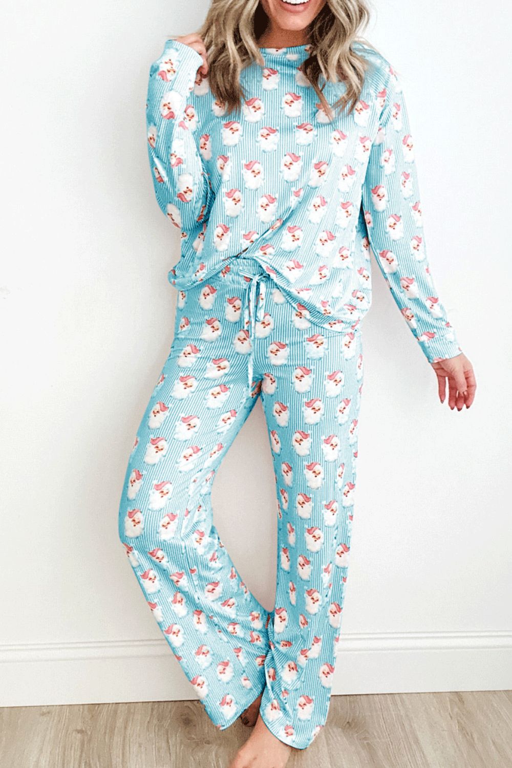 Pastel blue Santa stripe loungewear set with drawstring pants and long sleeve top.