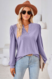 Lilac textured puff sleeve henley blouse with v-neck and long sleeves