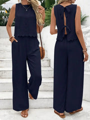 Dark blue linen lounge set with scalloped trim and back bow detail