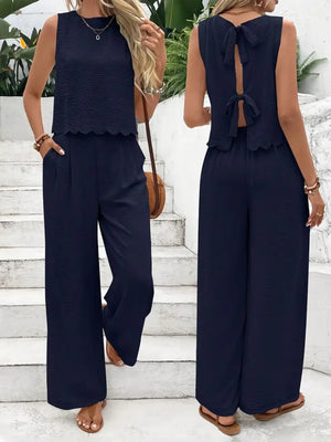Dark blue linen lounge set with scalloped trim and back bow detail