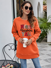 Orange oversized sweatshirt with Merry Christmas Y'all graphic and crew neck.