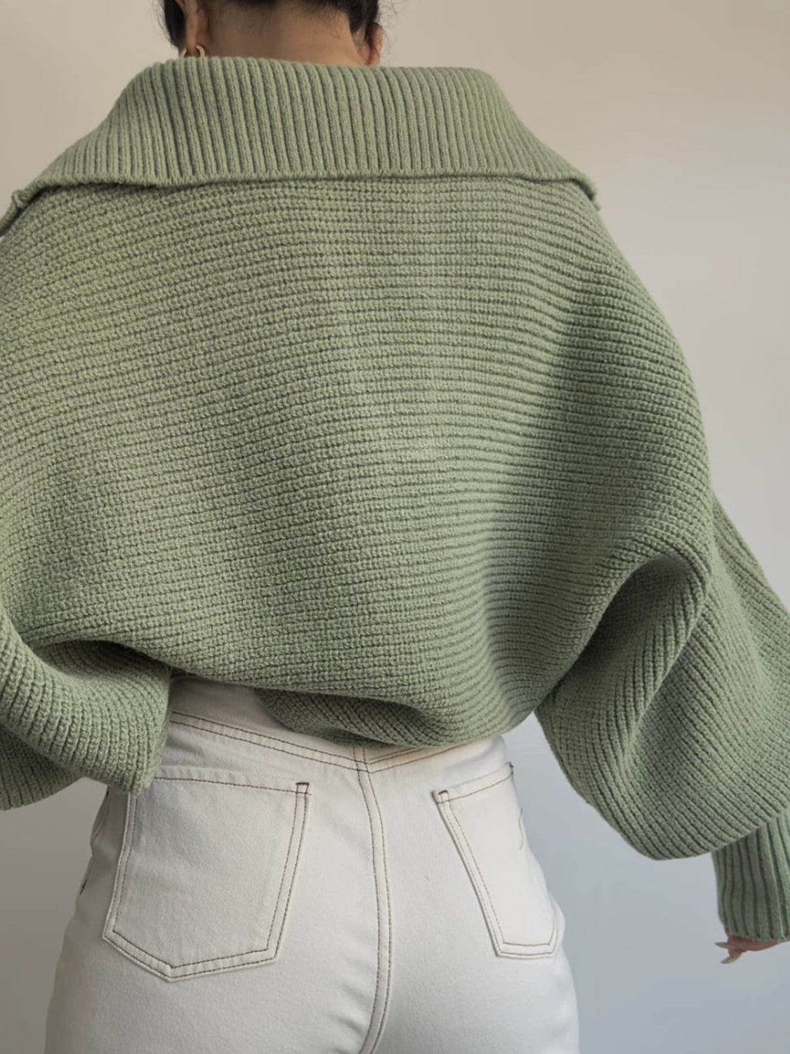 Army green knit sweater with wide collar and balloon sleeves.