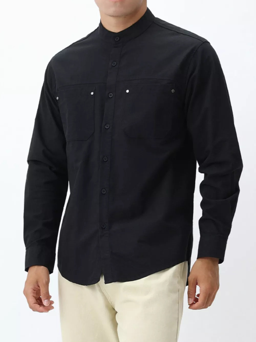 Black cotton long sleeve casual shirt with button-down front and chest pockets.