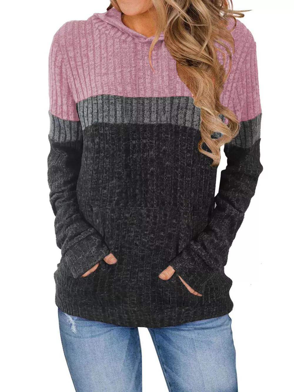 Color block ribbed knit hoodie with thumbholes and front pockets.