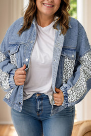 Denim oversized jacket with leopard print panels and button front closure.