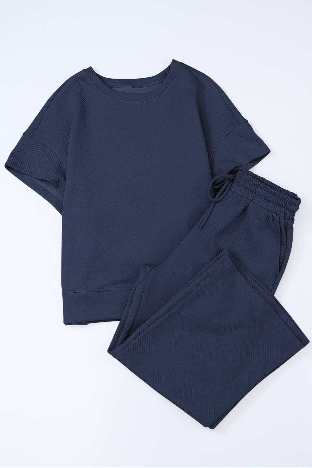 Dark blue textured knit tee and wide leg pants set with drawstring waist.