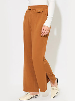 Seamed flare-leg trousers in sherbet with buttoned pocket detail and side slits.