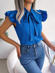 Cerulean ruffled sleeve pussybow blouse with a tie neck.