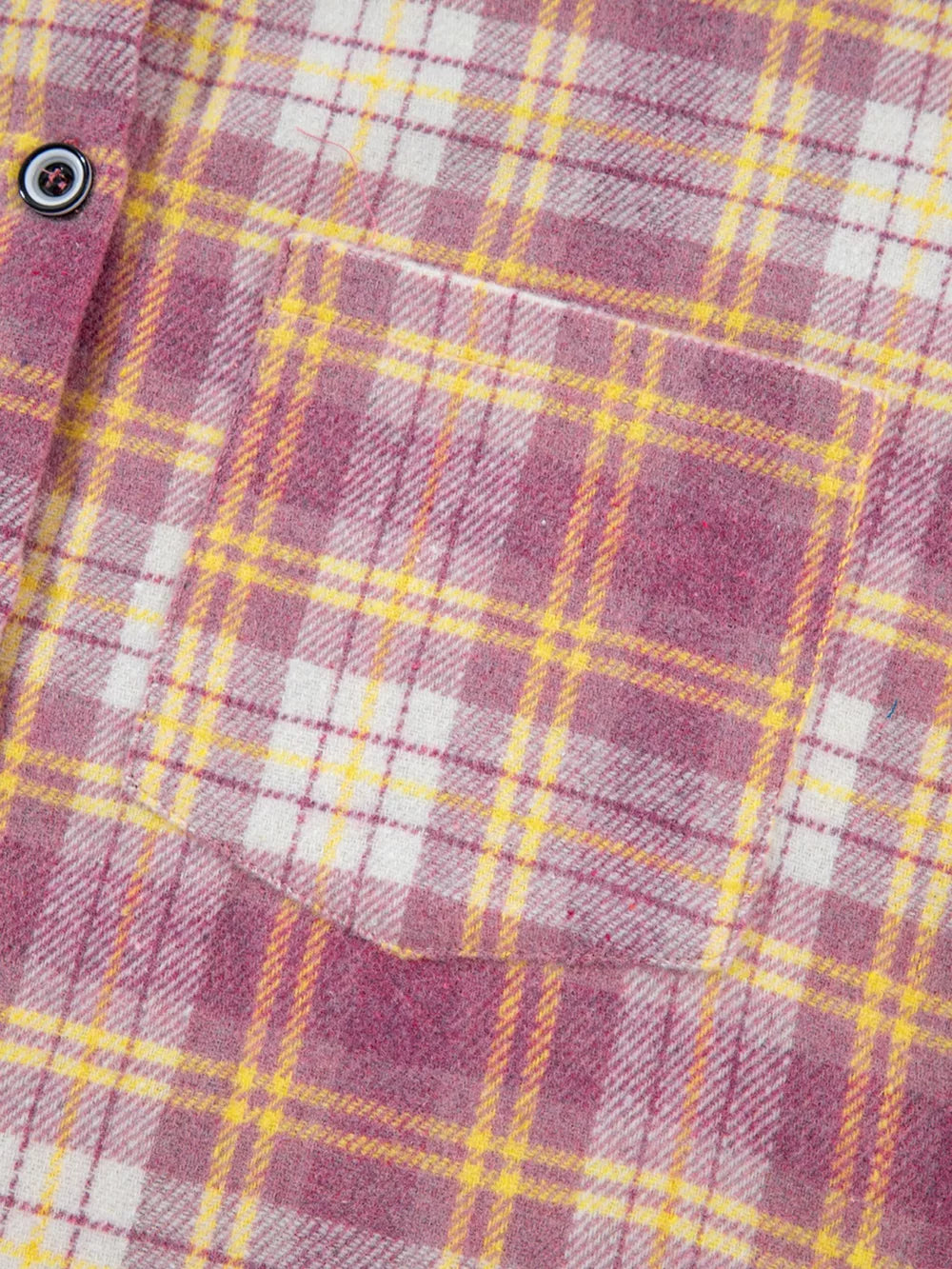 Oversized shacket with pink, yellow, and white plaid pattern, button-down front, and chest pocket.