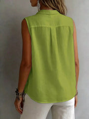 Effortless sleeveless button-up shirt in matcha green with a classic collar and back pleat detail.