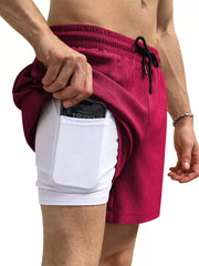 Burgundy chino shorts with built-in white compression shorts and phone pocket.