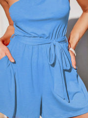 Sky blue asymmetrical knot-waist romper with tie belt and pockets.