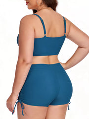 Plus size Peacock Blue swimwear set with adjustable straps and drawstring shorts.