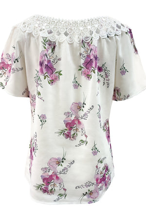 White floral blouse with lace yoke and short sleeves
