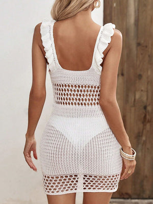 White open-knit crochet mini dress with ruffle straps and cutout detail.