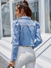 Light wash denim jacket with puffed sleeves and frayed hem
