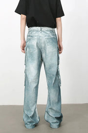 Bleached denim utility trousers in medium with multiple cargo pockets and a relaxed fit.