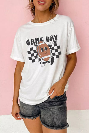White polyester graphic tee with a playful football character and "Game Day" text on a checkered background.
