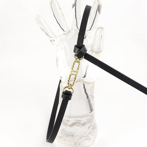 Black cowhide leather skinny belt with gold chain detail and buckle.
