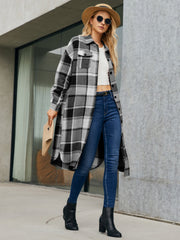 Oversized plaid shirt jacket dress in black and white, long sleeves, button front, side slits