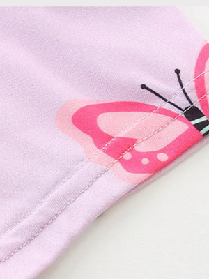 Toddler dress in light purple with a pink butterfly print and stitched seams.