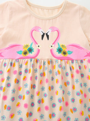 Peach cotton baby dress with flamingo print and floral skirt