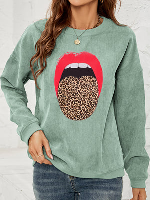 Light Green corduroy crewneck sweatshirt with a red lip and leopard print tongue graphic.