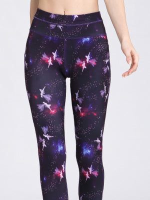 Cosmic print contour leggings in navy with fairy motifs and purple piping.