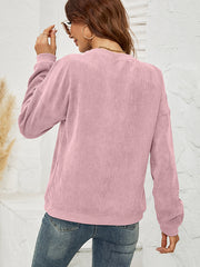 Dusty Pink corduroy sweatshirt with long sleeves and crew neck.