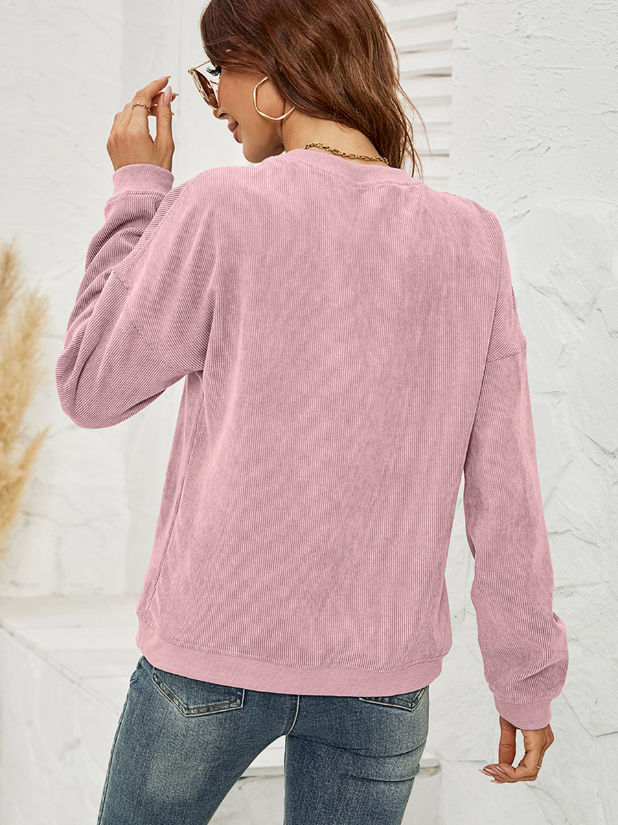 Dusty Pink corduroy sweatshirt with long sleeves and crew neck.