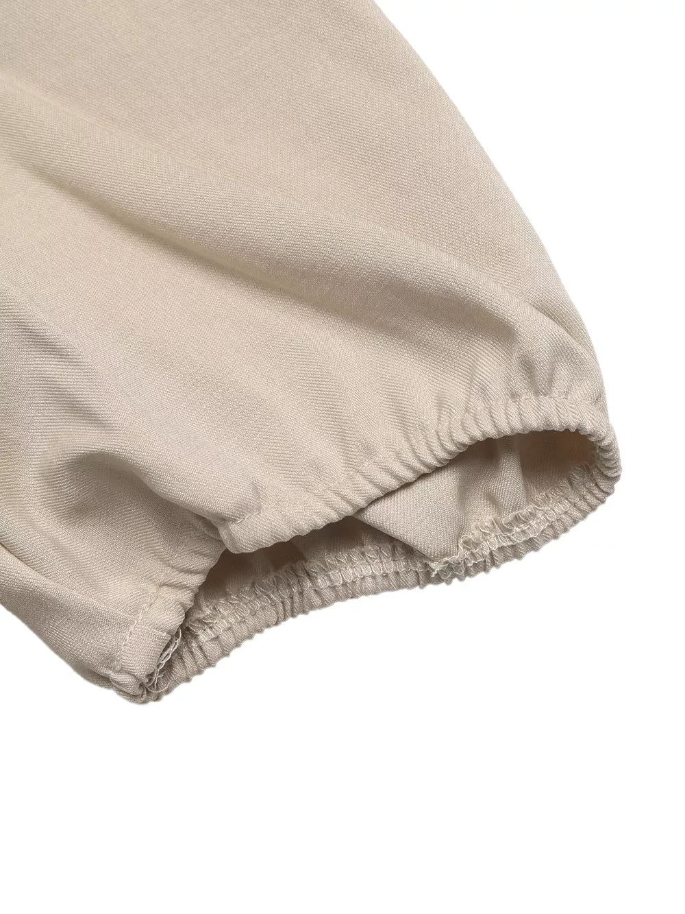 Beige V-neck blouse with elasticated cuff detail