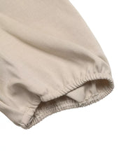 Beige V-neck blouse with elasticated cuff detail