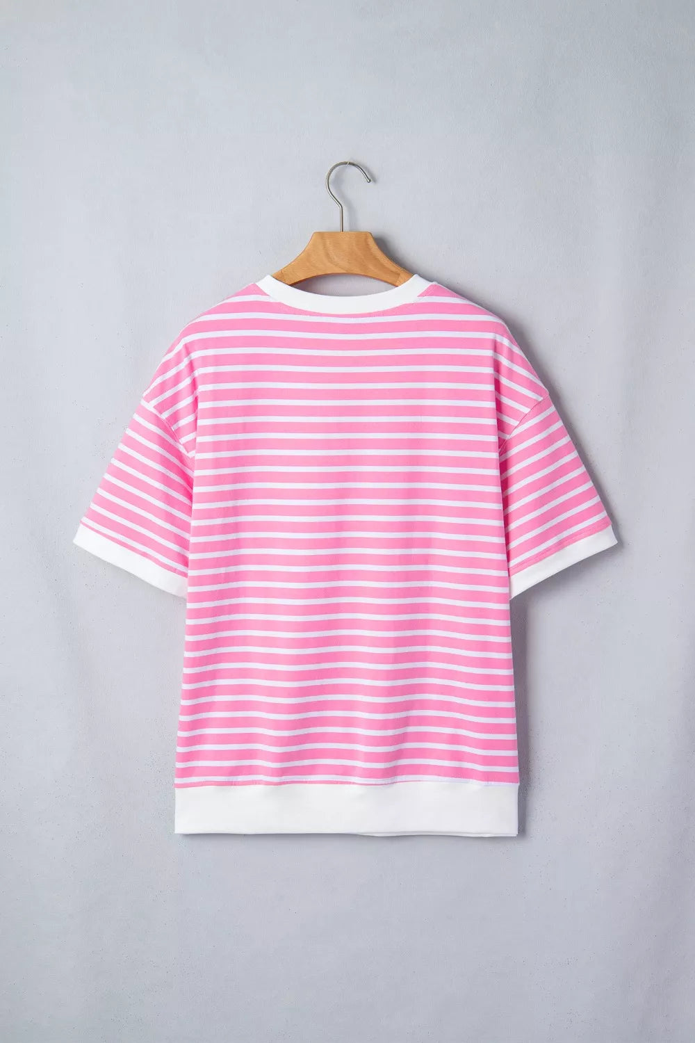 Bold stripe round neck t-shirt in pink and white cotton with white cuffs and hem.