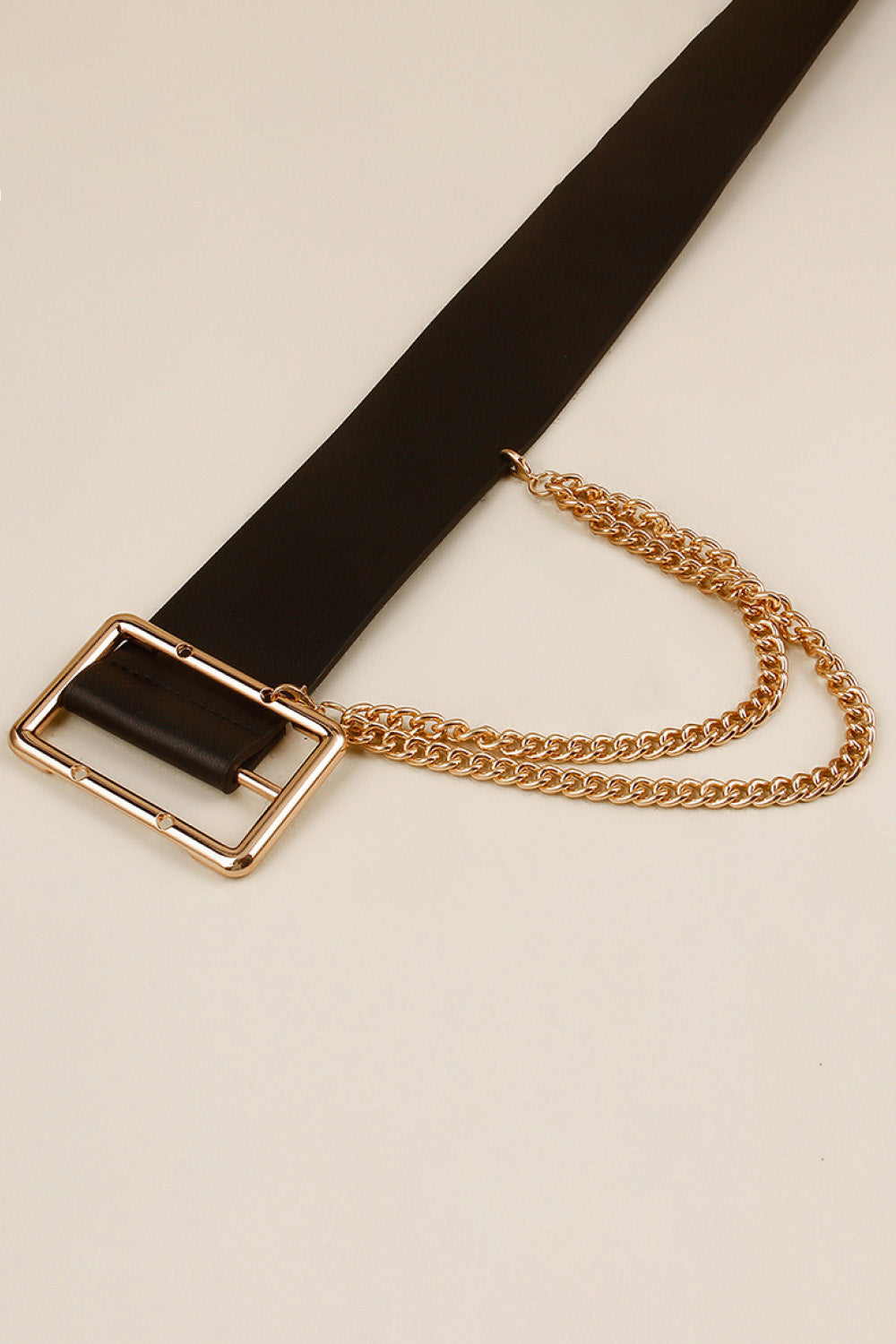Black faux leather belt with gold square buckle and double chain detail.