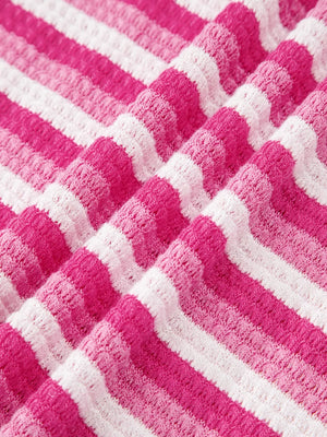 Textured knit tee with pink and white stripes and crossed detail.