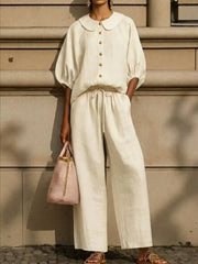 Chic monochrome two-piece set in apricot with pocketed top and drawstring pants.