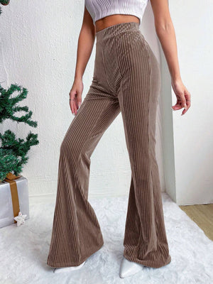 Textured corduroy bell bottom trousers in camel with a high waist.