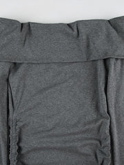 Grey ruched bodycon mini dress with drawstring detail and off-shoulder neckline.