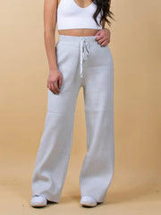 Light gray ribbed knit palazzo trousers with drawstring waist and wide leg