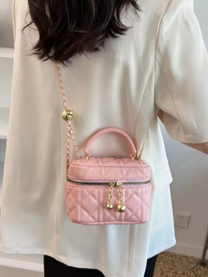 Quilted Mini Top Handle Crossbody Bag in Hot Pink, model styling view