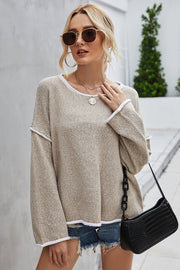 Oversized knit top in Sand with contrast white trim, crew neck, and long sleeves.