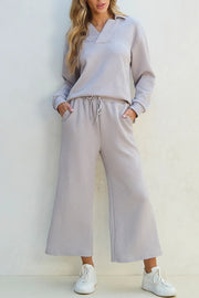 Gray textured quilted knit collared loungewear set with drawstring pants and long sleeves.